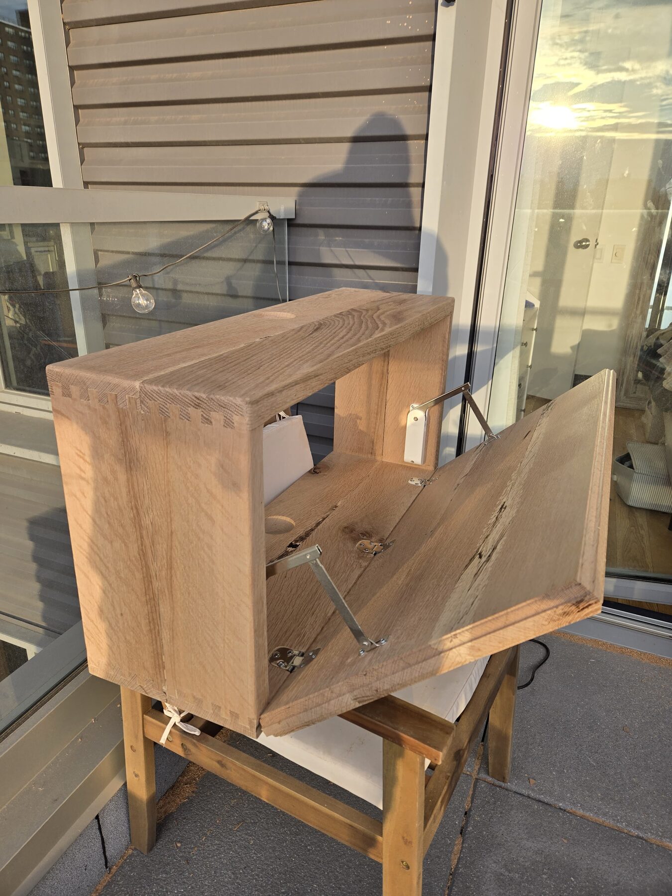 Hand-cut dovetail joinery on a custom oak console